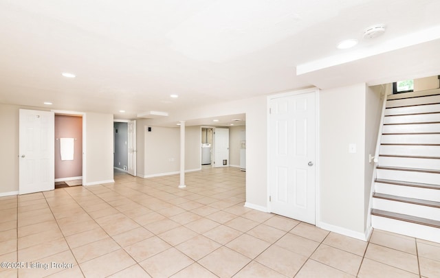 922 Fenley Ave, Louisville, KY 40222 - finished basement featuring recessed lighting, stairs, light tile patterned floors, baseboards, and washer / dryer