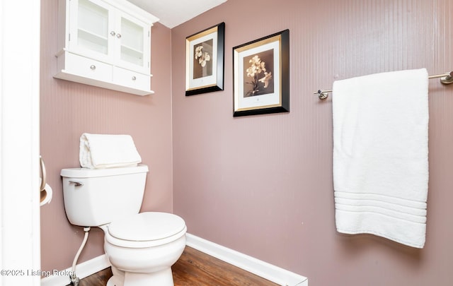 922 Fenley Ave, Louisville, KY 40222 - half bath featuring toilet, baseboards, and wood finished floors