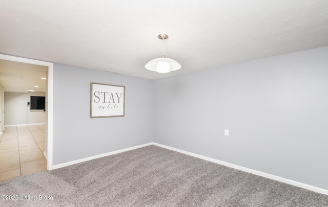 922 Fenley Ave, Louisville, KY 40222 - spare room featuring light carpet, baseboards, and light tile patterned floors