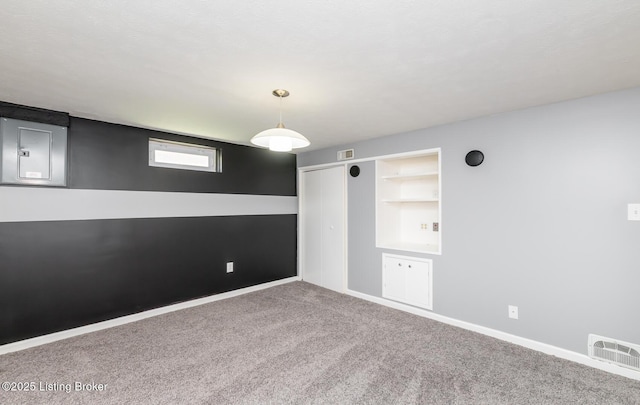 922 Fenley Ave, Louisville, KY 40222 - unfurnished room with carpet, baseboards, and built in shelves