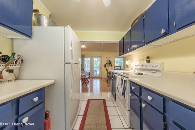 524 Lake Forest Ln, Westview, KY 40178 - kitchen with white appliances, blue cabinetry, light tile patterned floors, and light countertops