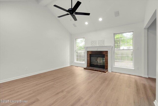8618 Shenandoah Dr, Pewee Valley, KY 40056 - unfurnished living room with high vaulted ceiling, healthy amount of natural light, beamed ceiling, a brick fireplace, and light wood finished floors
