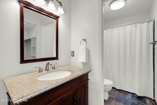 8618 Shenandoah Dr, Pewee Valley, KY 40056 - full bathroom with stone finish floors, vanity, toilet, and a shower with curtain