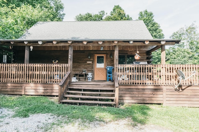 905 Camp Greenshores Rd, Mcdaniels, KY 40152 - view of front facade featuring log siding and roof with shingles