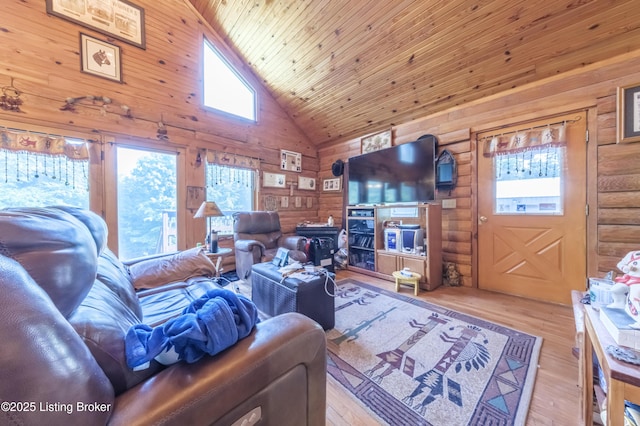 905 Camp Greenshores Rd, Mcdaniels, KY 40152 - living area featuring high vaulted ceiling, wood finished floors, wooden walls, wood ceiling, and log walls
