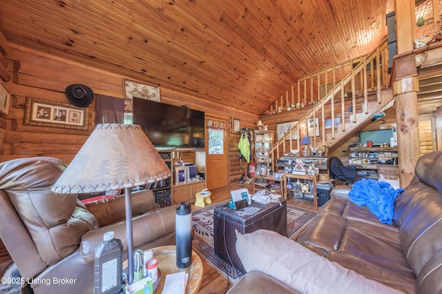 905 Camp Greenshores Rd, Mcdaniels, KY 40152 - living area featuring log walls, stairs, wood finished floors, vaulted ceiling, and wood ceiling