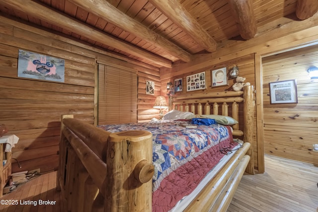 905 Camp Greenshores Rd, Mcdaniels, KY 40152 - bedroom featuring a wood ceiling with exposed beams, rustic walls, and light wood-type flooring