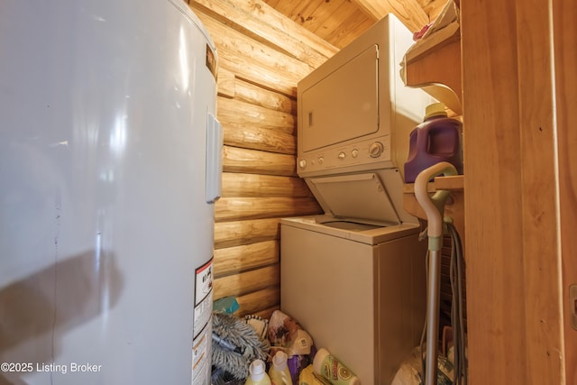 905 Camp Greenshores Rd, Mcdaniels, KY 40152 - laundry area with stacked washer / dryer, rustic walls, and electric water heater
