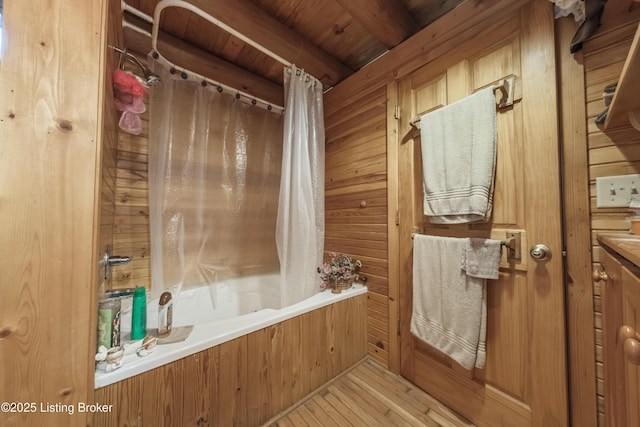 905 Camp Greenshores Rd, Mcdaniels, KY 40152 - bathroom with wooden walls, wood finished floors, shower / tub combo with curtain, and a wood ceiling with exposed beams