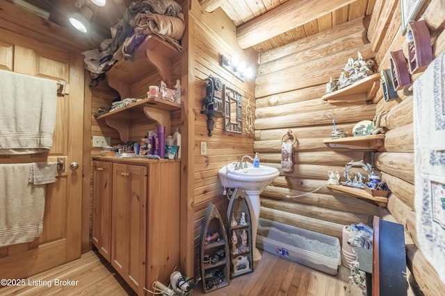 905 Camp Greenshores Rd, Mcdaniels, KY 40152 - bathroom with hardwood / wood-style flooring, wooden ceiling, and log walls