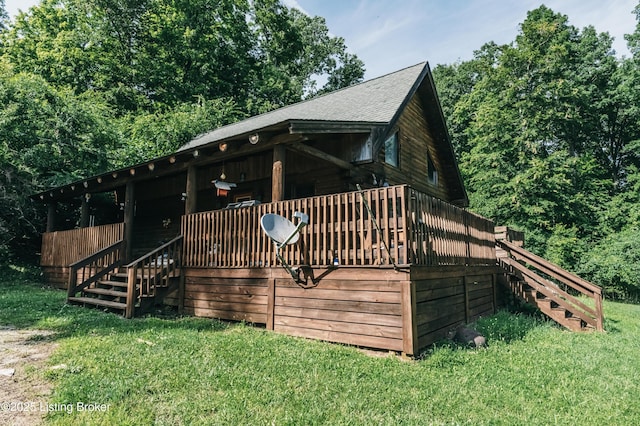 905 Camp Greenshores Rd, Mcdaniels, KY 40152 - back of property with stairs, a lawn, roof with shingles, and a deck