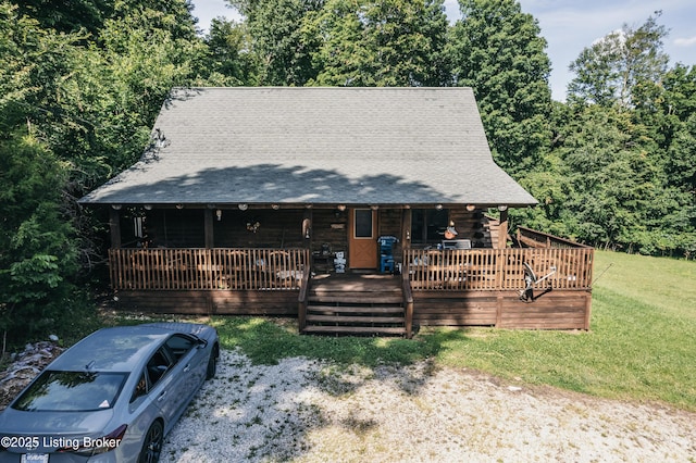 905 Camp Greenshores Rd, Mcdaniels, KY 40152 - log cabin featuring a front yard and a shingled roof