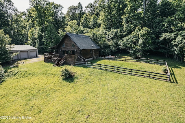 905 Camp Greenshores Rd, Mcdaniels, KY 40152 - fenced backyard with an outdoor structure, stairway, a detached garage, a deck, and a view of trees