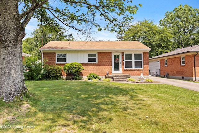 10608 Charlene Dr, Fairdale, KY 40118 - view of front facade with brick siding and a front lawn