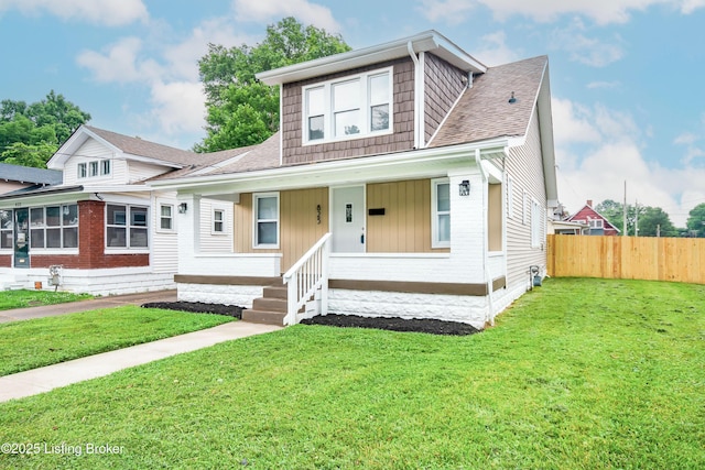 825 S 42nd St, Louisville, KY 40211 - view of front of home with a shingled roof, a porch, and a sunroom