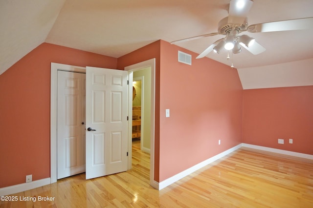 8201 Damascus Rd, Louisville, KY 40228 - bonus room with lofted ceiling, ceiling fan, light wood finished floors, and baseboards