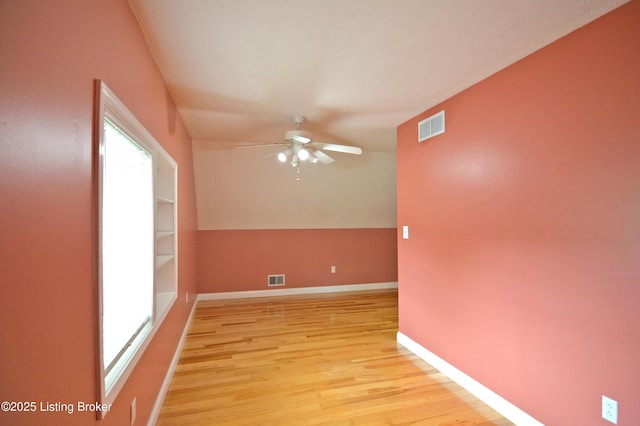 8201 Damascus Rd, Louisville, KY 40228 - spare room with ceiling fan, light wood finished floors, and baseboards
