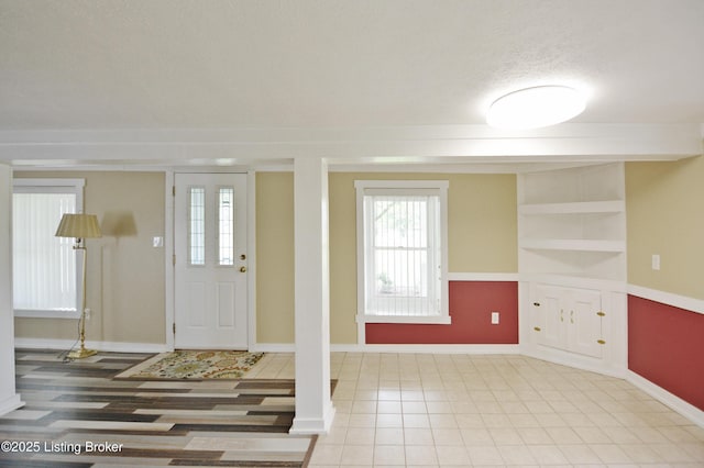 8201 Damascus Rd, Louisville, KY 40228 - entrance foyer with baseboards and healthy amount of natural light