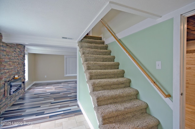 8201 Damascus Rd, Louisville, KY 40228 - stairs with a fireplace
