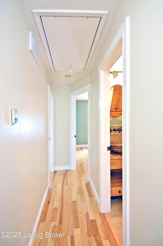 8201 Damascus Rd, Louisville, KY 40228 - hall featuring attic access, light wood-style flooring, and baseboards