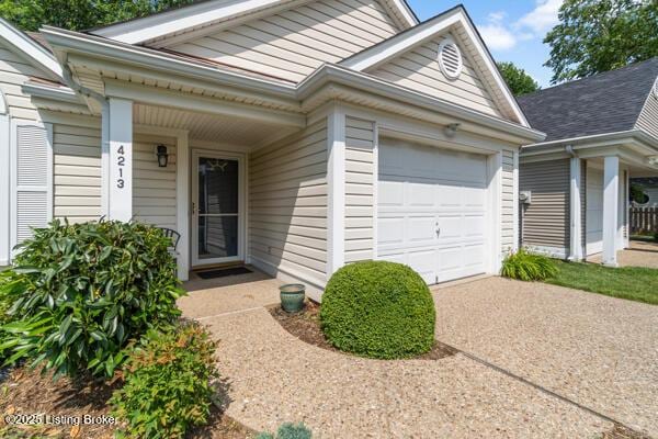 4213 Bay Pointe Dr, Louisville, KY 40241 - property entrance with a garage and concrete driveway