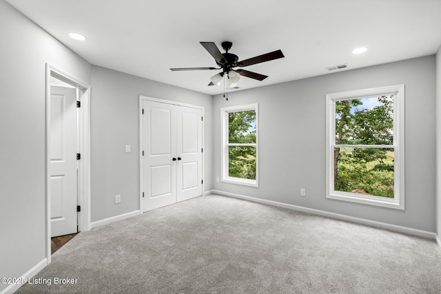 5482 Bagdad Rd, Bagdad, KY 40003 - unfurnished bedroom featuring carpet, baseboards, recessed lighting, a closet, and a ceiling fan