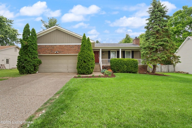 12409 Ledges Dr, Louisville, KY 40243 - view of front of home with brick siding, a garage, a porch, concrete driveway, and a chimney