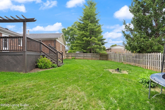 12409 Ledges Dr, Louisville, KY 40243 - view of yard featuring a trampoline, a deck, and stairway