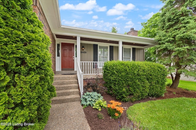 12409 Ledges Dr, Louisville, KY 40243 - view of front of house with a chimney, board and batten siding, and a porch