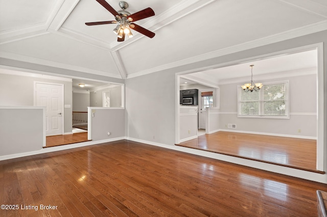 12409 Ledges Dr, Louisville, KY 40243 - unfurnished living room featuring wood finished floors, vaulted ceiling, a chandelier, ceiling fan, and ornamental molding