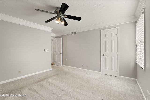 12409 Ledges Dr, Louisville, KY 40243 - unfurnished bedroom with ornamental molding, light carpet, baseboards, a ceiling fan, and a textured ceiling
