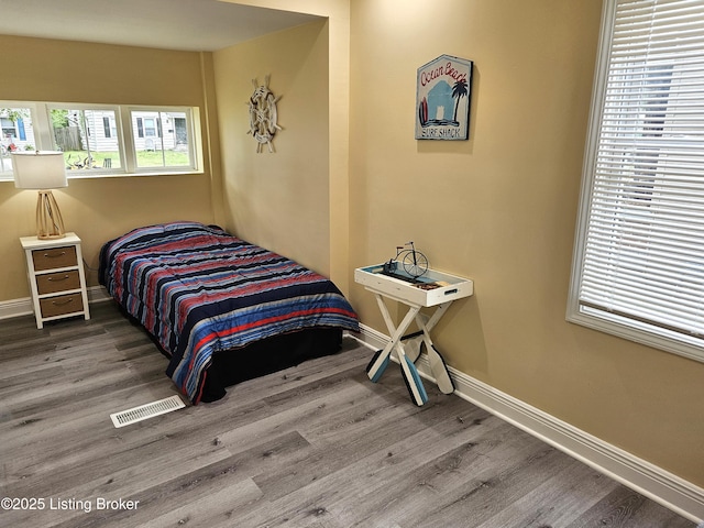 1165 Lincoln Ave, Louisville, KY 40208 - bedroom with baseboards and wood finished floors