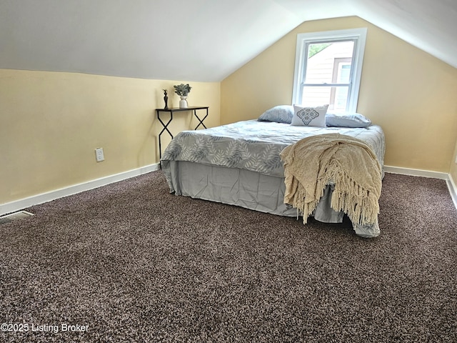 1165 Lincoln Ave, Louisville, KY 40208 - bedroom with carpet flooring, vaulted ceiling, and baseboards