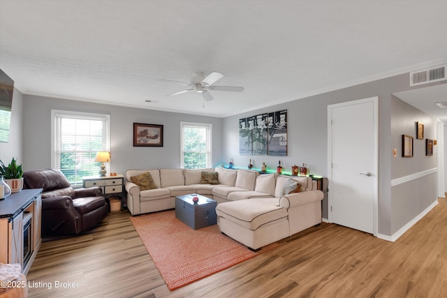 1008 Lake Way Unit D12, Louisville, KY 40222 - living room featuring light wood-style flooring, a ceiling fan, and baseboards