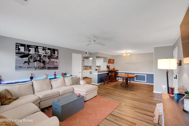 1008 Lake Way Unit D12, Louisville, KY 40222 - living room featuring light wood-style flooring, ceiling fan, and crown molding