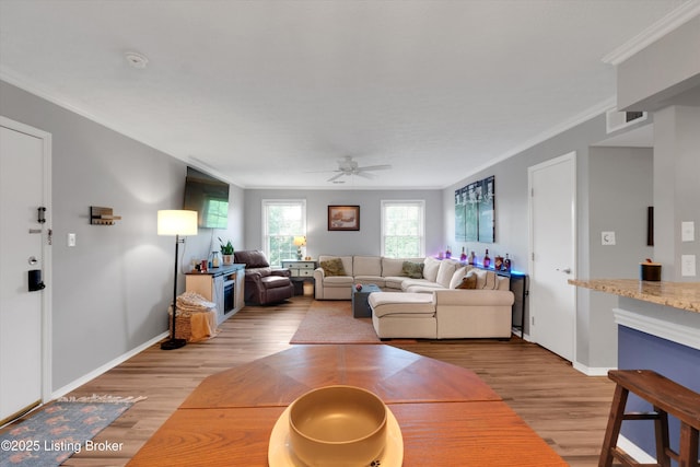 1008 Lake Way Unit D12, Louisville, KY 40222 - living area with crown molding, a ceiling fan, light wood-style flooring, and baseboards