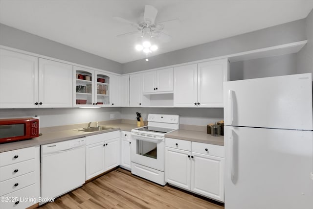 1008 Lake Way Unit D12, Louisville, KY 40222 - kitchen featuring white appliances, a sink, light wood-type flooring, white cabinets, and a ceiling fan