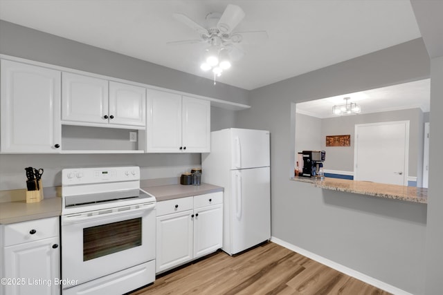 1008 Lake Way Unit D12, Louisville, KY 40222 - kitchen featuring white appliances, light countertops, light wood-type flooring, and white cabinetry
