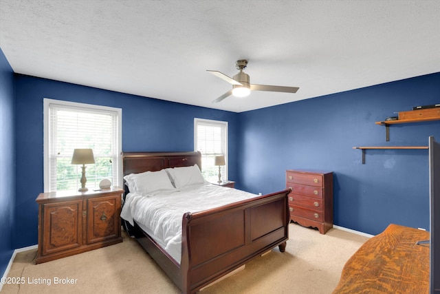 1008 Lake Way Unit D12, Louisville, KY 40222 - bedroom with light carpet, baseboards, a ceiling fan, and a textured ceiling