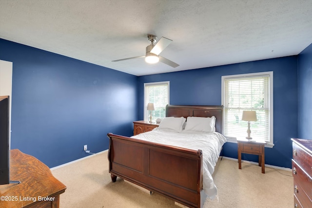 1008 Lake Way Unit D12, Louisville, KY 40222 - carpeted bedroom with baseboards, ceiling fan, and a textured ceiling