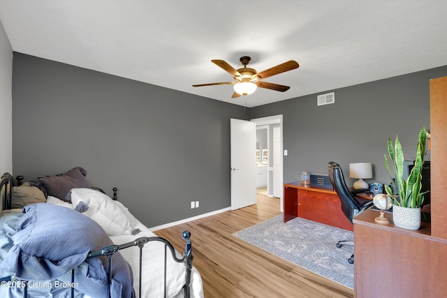 1008 Lake Way Unit D12, Louisville, KY 40222 - bedroom featuring wood finished floors, baseboards, an office area, and a ceiling fan