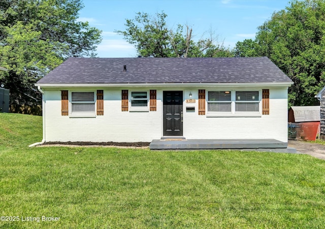 4512 Grandview Dr, Louisville, KY 40216 - single story home with a front lawn, brick siding, and a shingled roof
