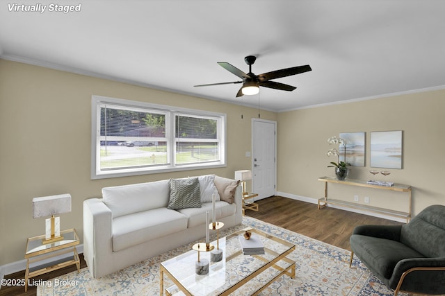 4512 Grandview Dr, Louisville, KY 40216 - living area featuring wood finished floors, a ceiling fan, crown molding, and baseboards