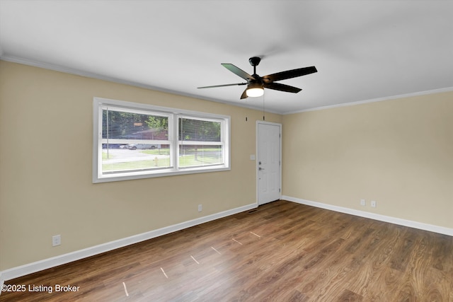 4512 Grandview Dr, Louisville, KY 40216 - spare room featuring ceiling fan, wood finished floors, crown molding, and baseboards