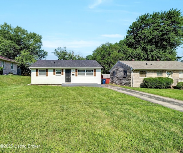 4512 Grandview Dr, Louisville, KY 40216 - single story home with a front lawn