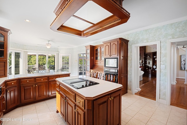 14702 Forest Oaks Dr, Louisville, KY 40245 - kitchen with black electric cooktop, wallpapered walls, oven, a ceiling fan, and light countertops