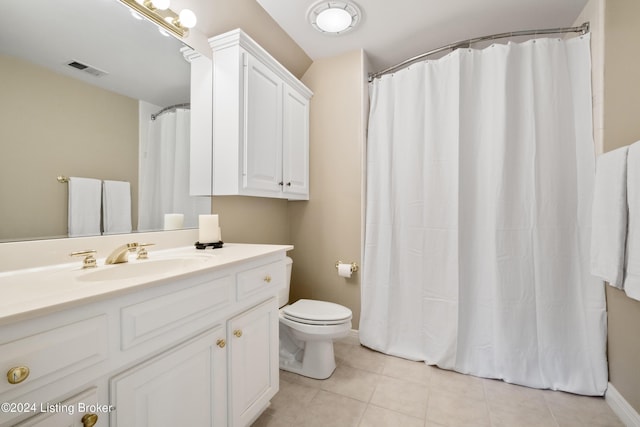 14702 Forest Oaks Dr, Louisville, KY 40245 - full bath with vanity, toilet, tile patterned flooring, and baseboards