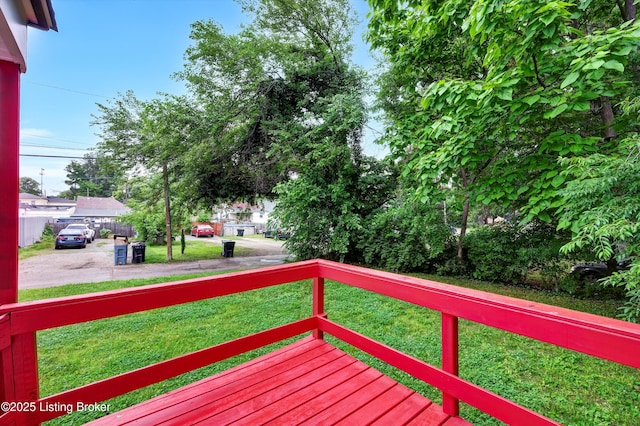 209 W Kenton St, Louisville, KY 40214 - wooden deck featuring a yard