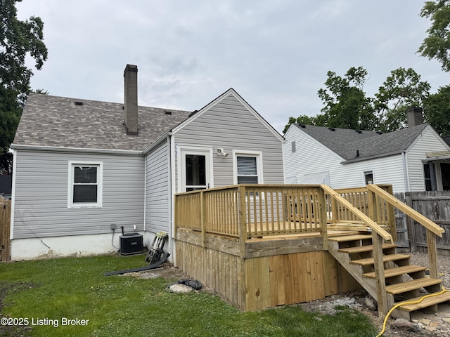 1236 Carrico Ave, Louisville, KY 40215 - rear view of property with a deck, central AC, a chimney, and roof with shingles