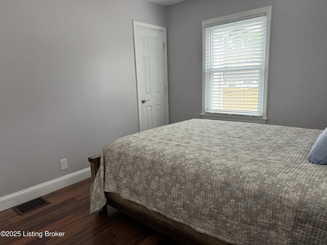 1236 Carrico Ave, Louisville, KY 40215 - bedroom featuring dark wood finished floors and baseboards